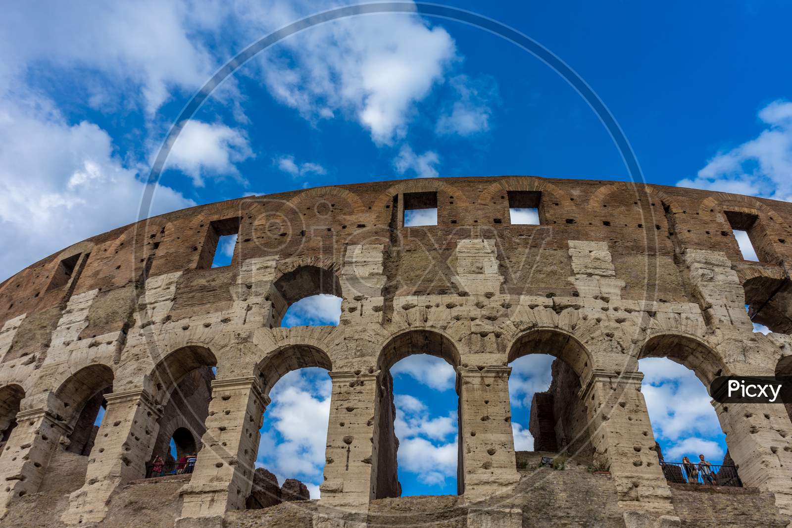 Rome, Italy - 23 June 2018: Facade Of The Great Roman Colosseum (Coliseum, Colosseo), Also Known As The Flavian Amphitheatre