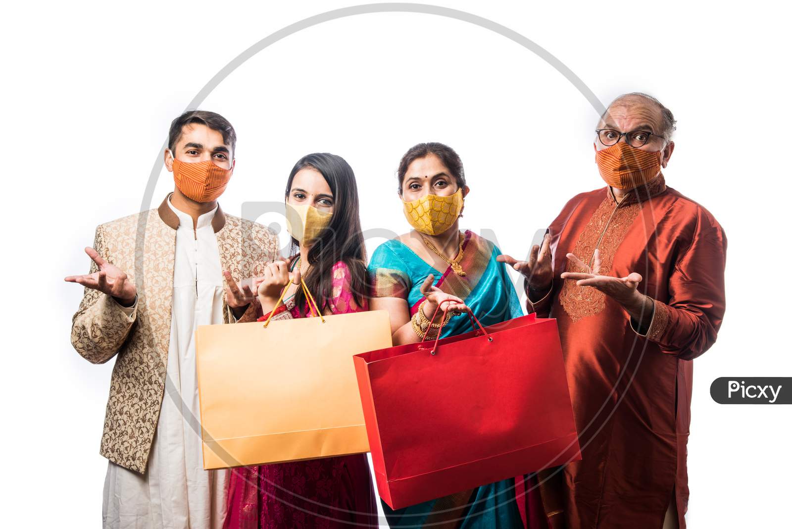 Indian Family Shopping For Diwali Or Wedding, Wears Face Mask