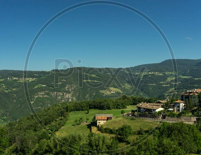 Italy, Train From Bolzano To Venice, A View Of A Lush Green Hillside