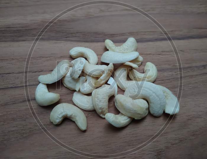 Cashew nuts on wooden background