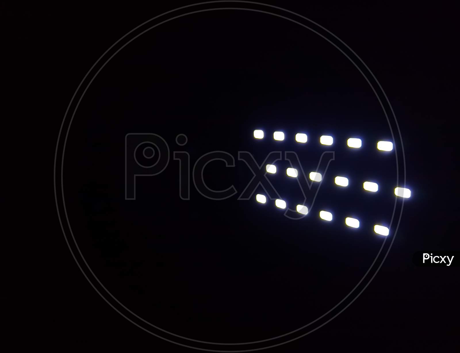 Small LED spotlight on black background