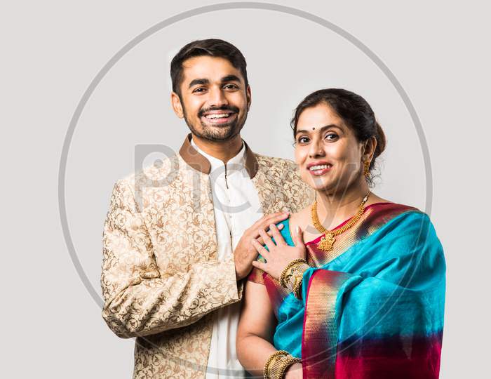 Portrait Of Asian Indian Mother Son In Traditional And Designer Festival Outfit