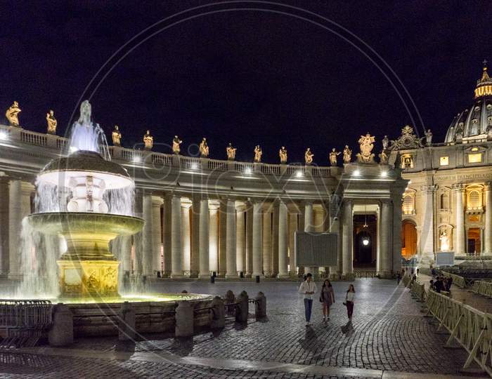 Vatican City,Italy - 23 June 2018: The Water Fountain Is Lit Up At St.Peters Square In Vatican City At Night