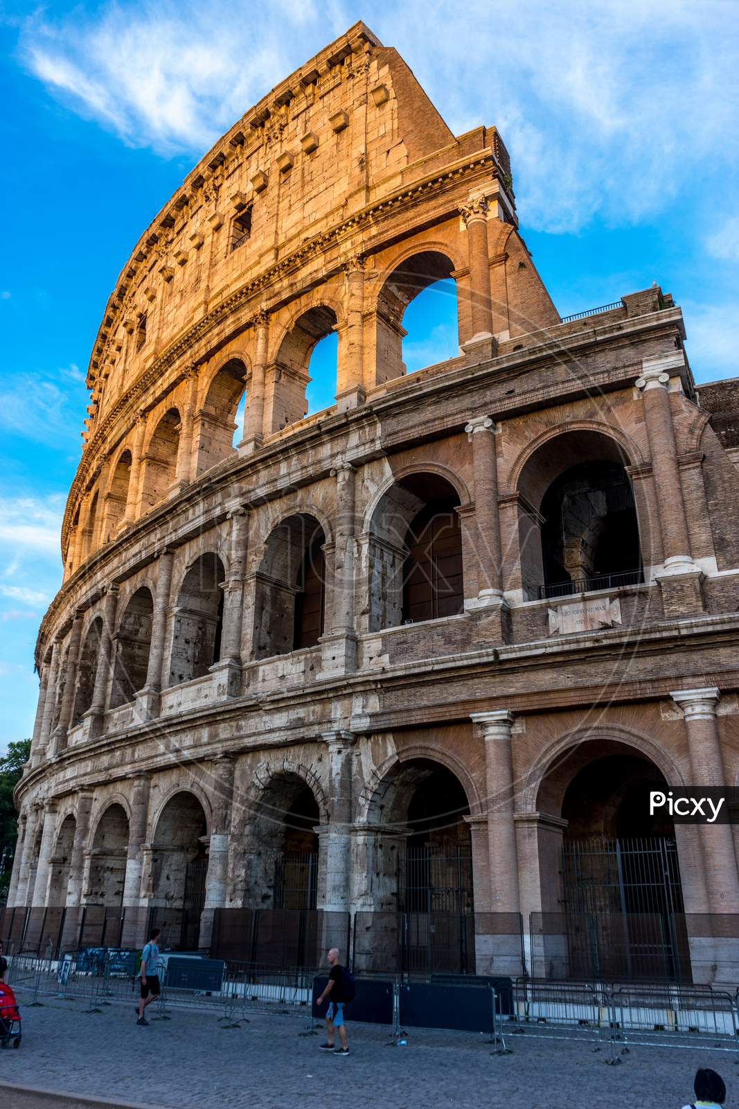 Rome, Italy - 23 June 2018: Facade Of The Great Roman Colosseum (Coliseum, Colosseo), Also Known As The Flavian Amphitheatre