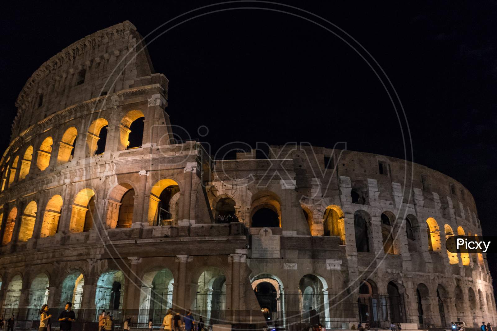 Rome, Italy - 24 June 2018: Night At The Great Roman Colosseum (Coliseum, Colosseo), Also Known As The Flavian Amphitheatre With Lights & Illumination.