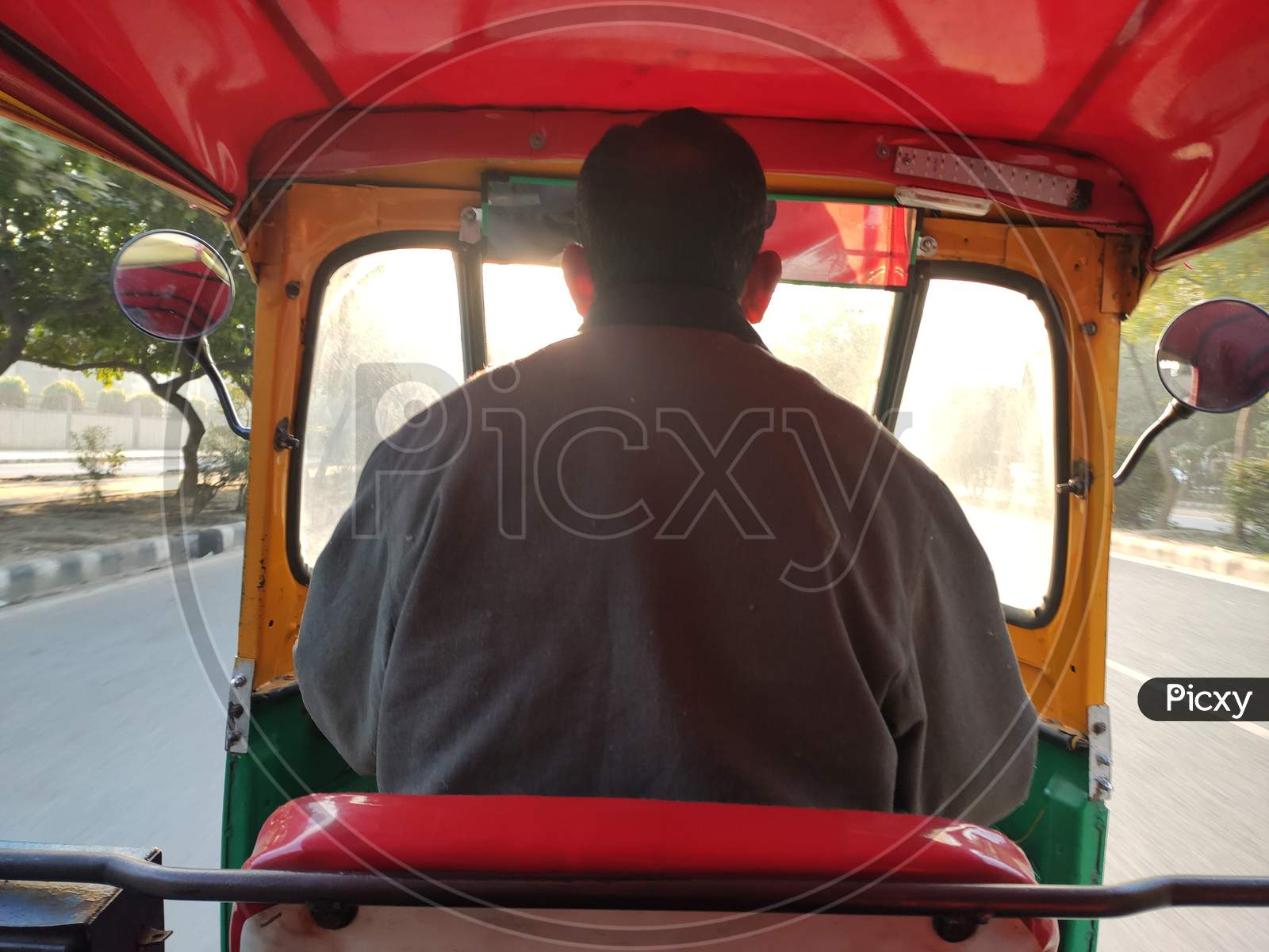 rare view Close up shot of indian auto rickshaw or rickshaw driver or tuktuk driver