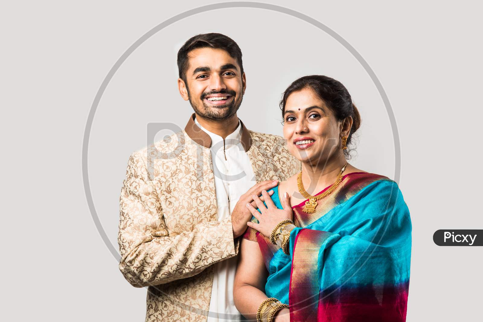 Image of Portrait Of Asian Indian Mother Son In Traditional And Designer  Festival Outfit-UV842348-Picxy