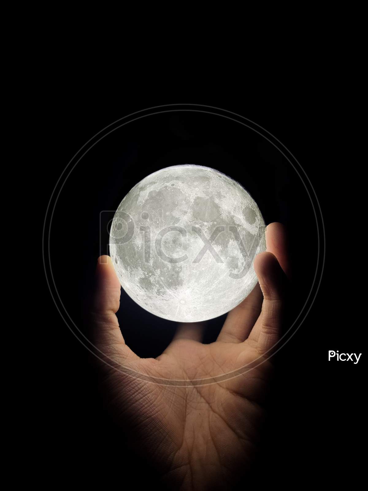 moon in  hand