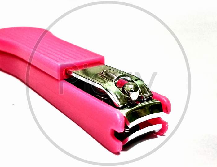 Pink Nail Clipper On White Background