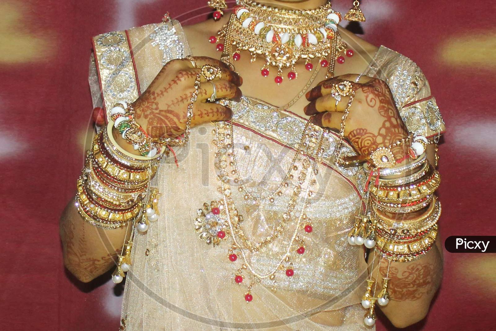 Indian marriage attire and lifestyle. Indian Gujarati Bride or Dulhan in her traditional ethnic wedding dress.Indian marriage attire and lifestyle.