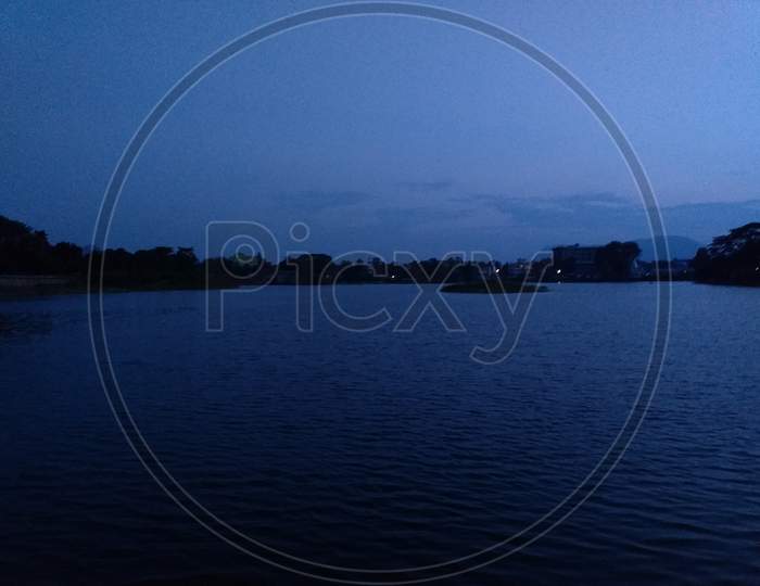view of a lake after sunset