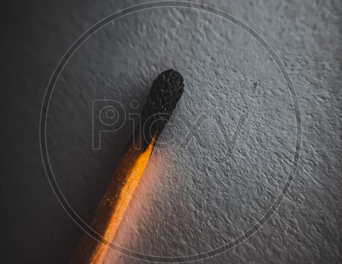 Filtered theme with details and texture of burned matchstick.