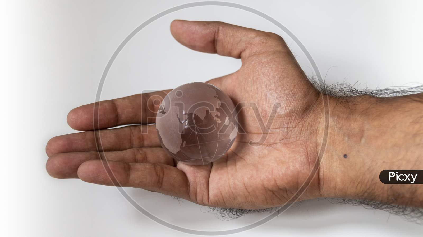 Transparent Globe In The Hand