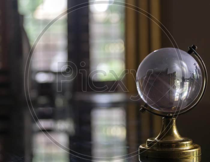Transparent Globe On The Table