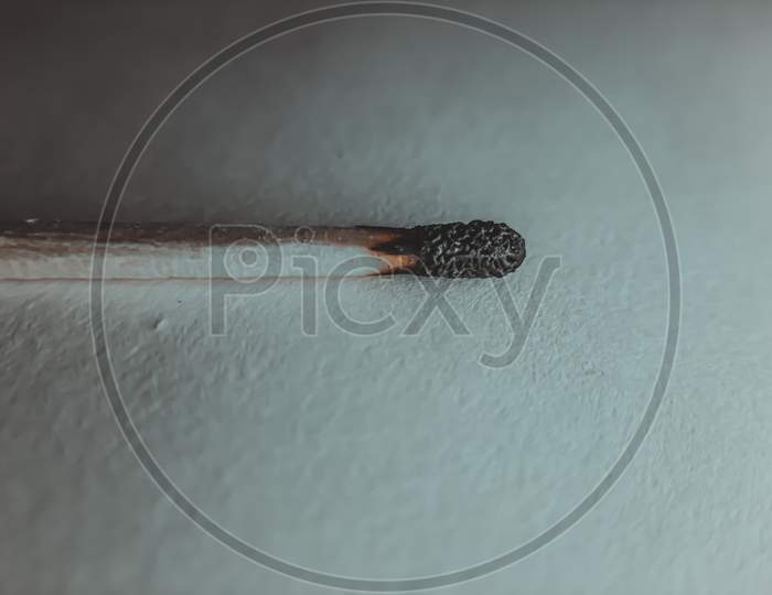 Burned matchstick giving details and texture of it.