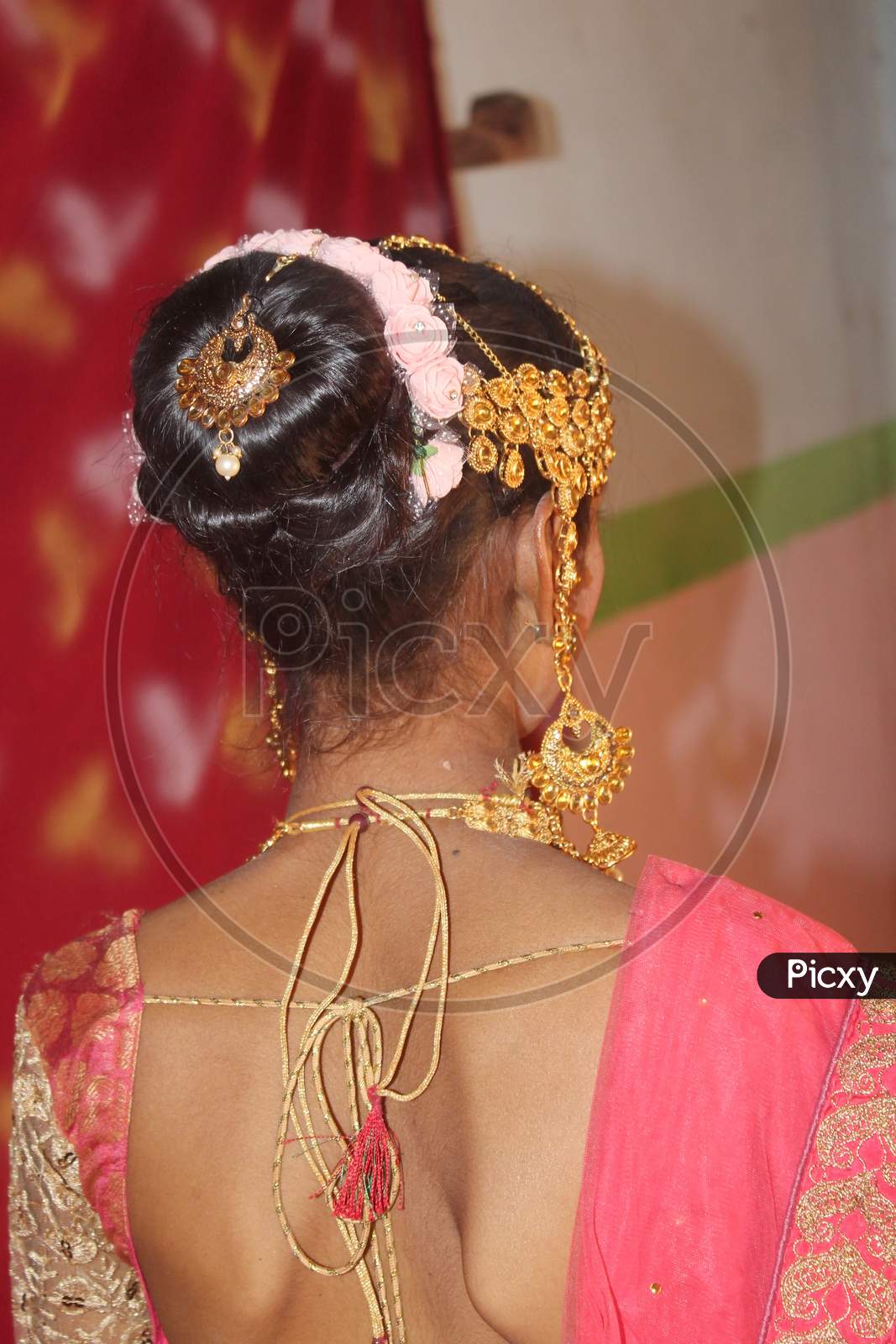 Indian marriage attire and lifestyle. Indian Gujarati Bride or Dulhan in her traditional ethnic wedding dress.Indian marriage attire and lifestyle.