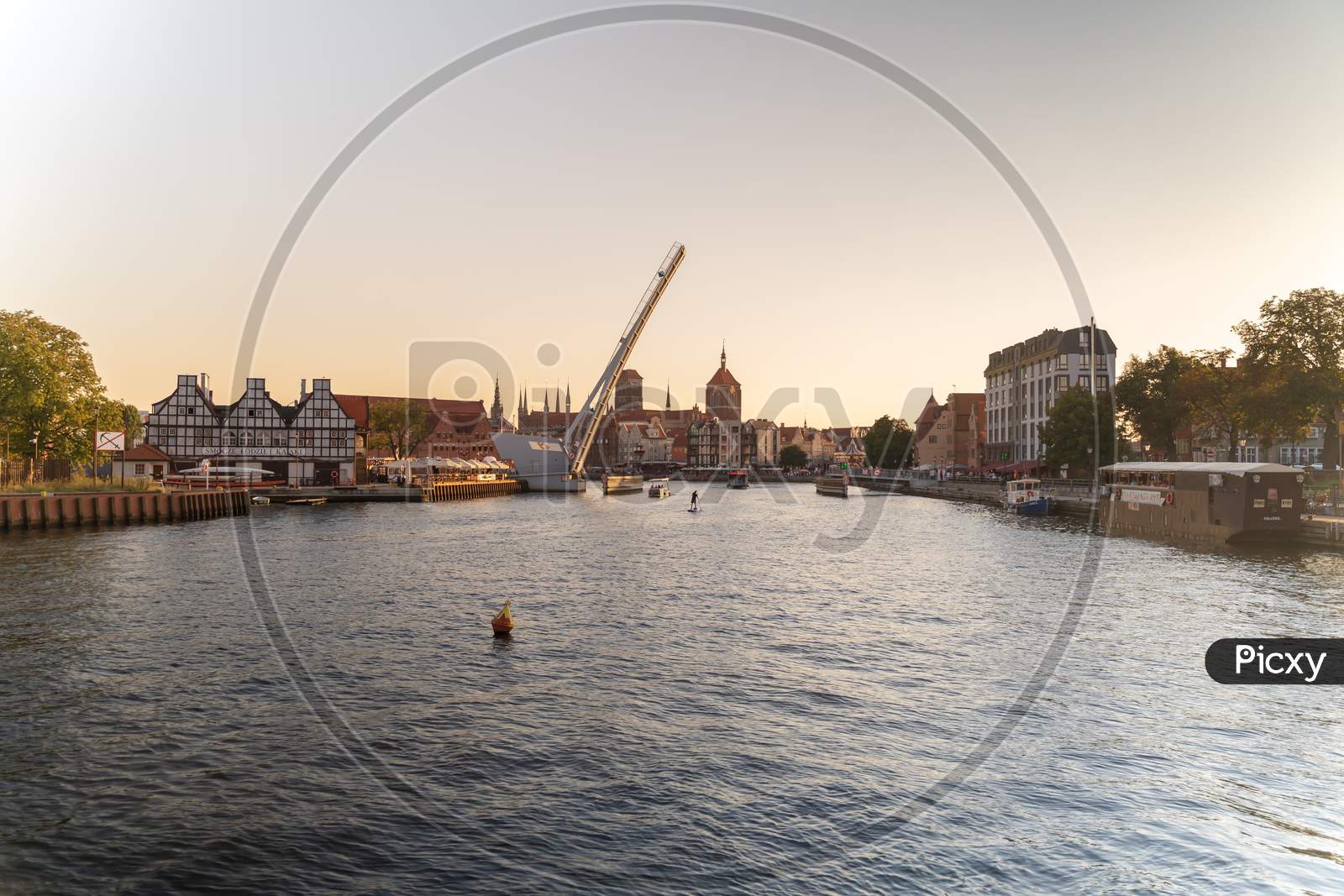 Gdansk, North Poland - August 15, 2020: Polish Architecture Over Motlawa River During Sunset
