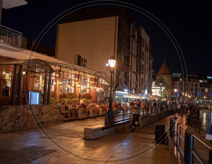 Gdansk, North Poland - August 13, 2020: Night Photography Of Old Town Commercial Market During Covid Time Over Motlawa River Near Baltic Sea