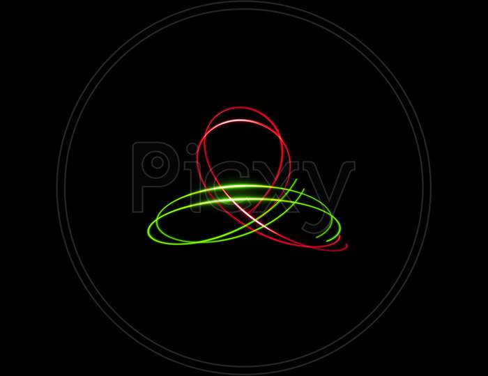Red And Light Green Mixed Circle Mixed Light Painting Photography, Long Exposure, Ripples And Waves Against A Black Background