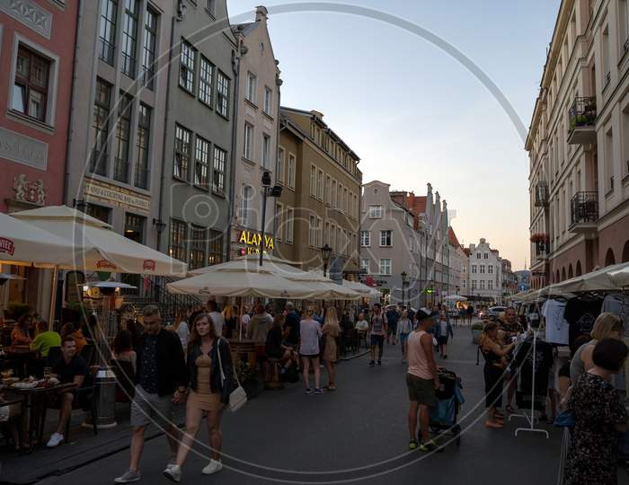 Gdansk, North Poland - August 15, 2020: People Are Walking In The City Center Main Square In The Old Town After Masks Were Not Mandatory To Wear Outdoors During Covid 19