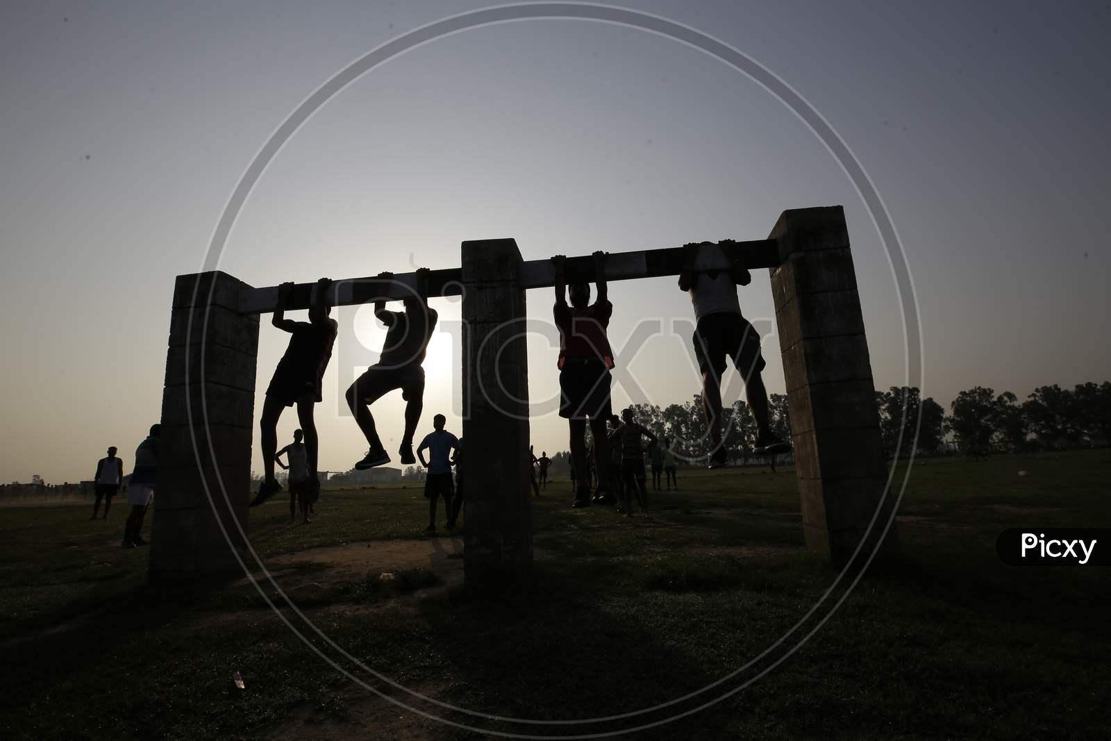 Youth perform physical exercises during practice session for upcoming Recruitment for border youth in security forces,near international border ranbir Singh pura outskirts in Jammu on September 11,2020.