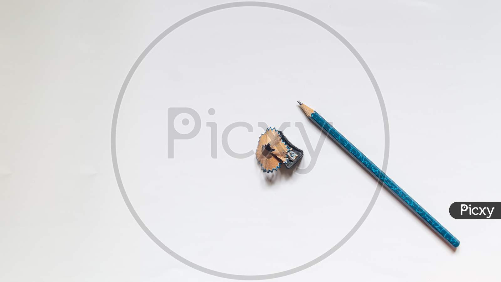 Pencil With Sharpener On White Background