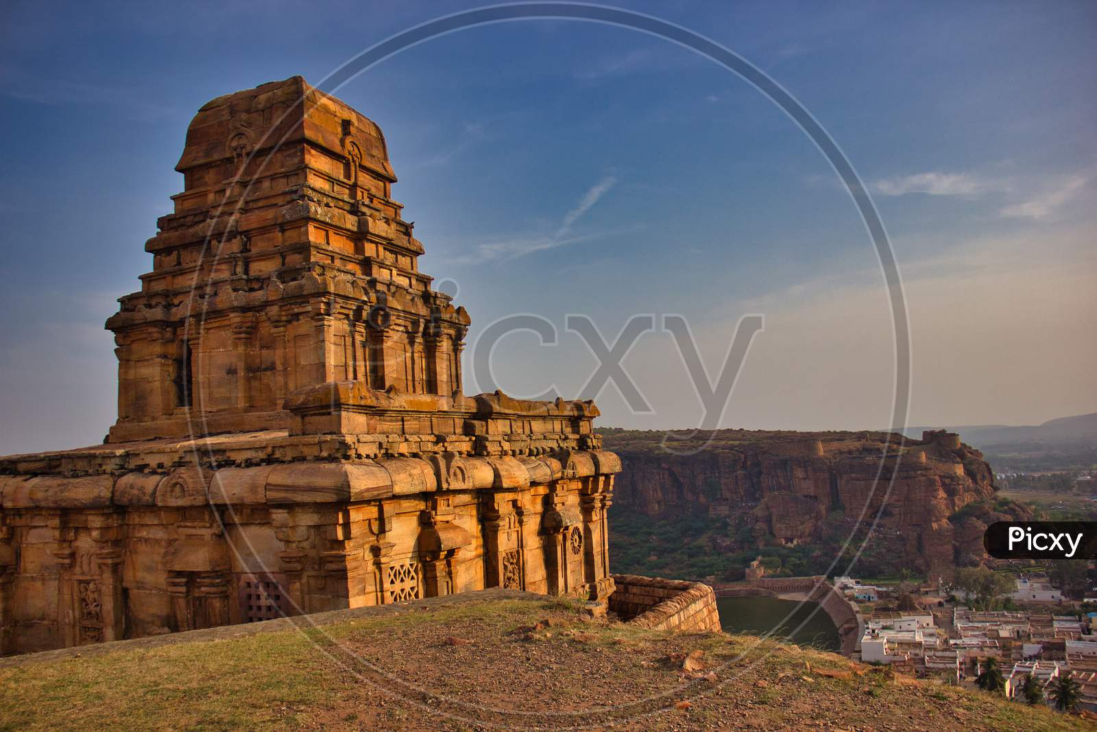 Image of Badami Cave Temples with drmatic background, Unesco world heritage  site, Karnataka, India-XR734149-Picxy