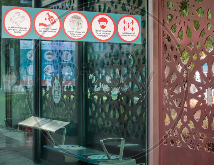 Signs And Symboles For Social Distancing In Abu Dhabi Bus Station.