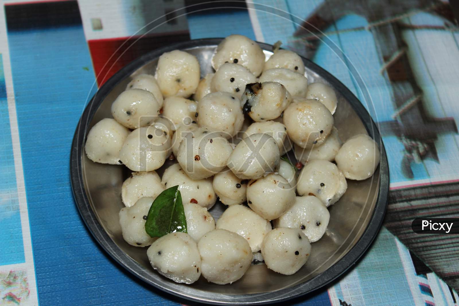 Image Of Neer Kozhukkatta   Neer Kozhukattai - Indian Food, Close Up 