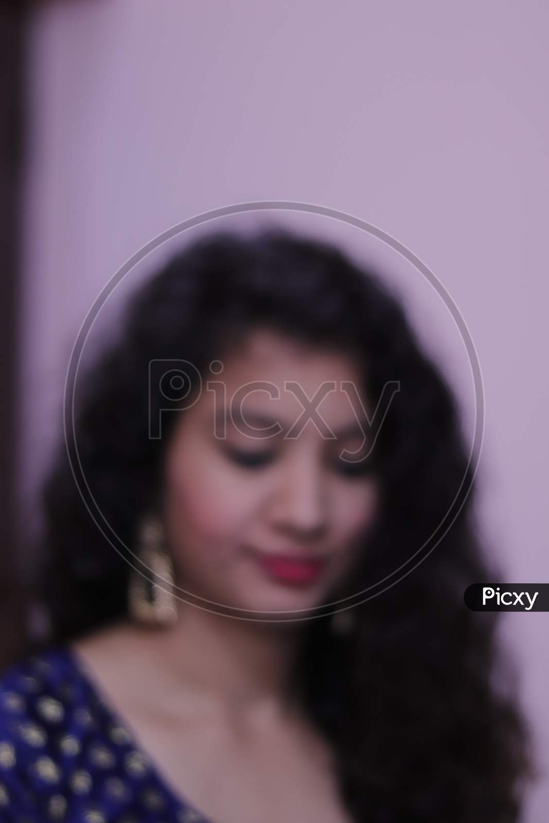 blurred portrait of beautiful indian young woman