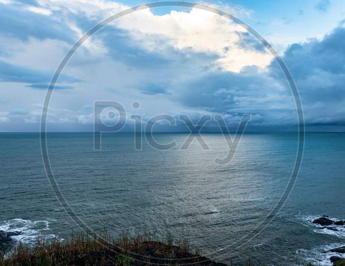 Sea Horizon View With Dramatic Cloud From Mountain Top