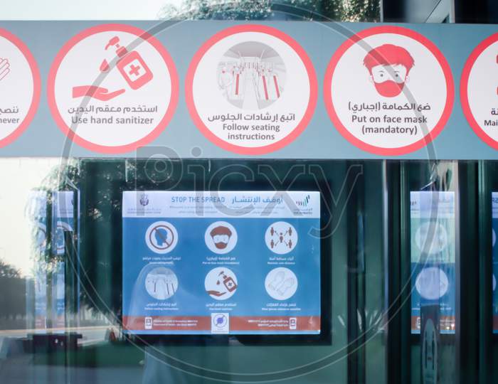 Signs And Symboles For Social Distancing In Abu Dhabi Bus Station.