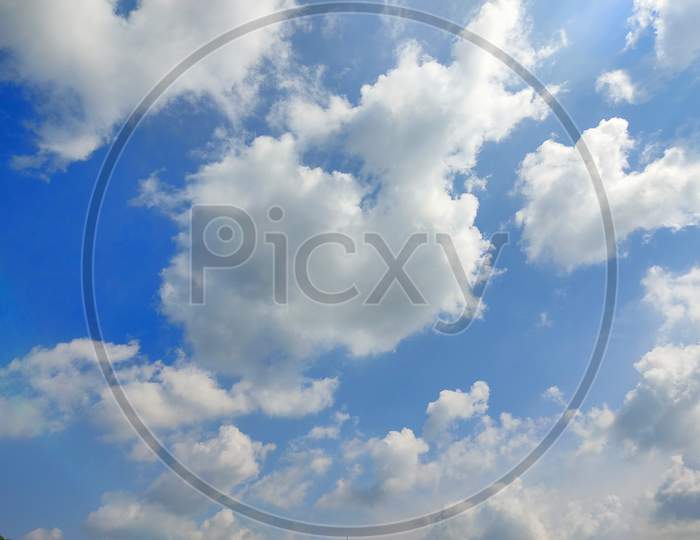 clouds with blue sky .