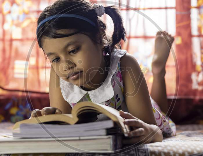 Studying Girl Child