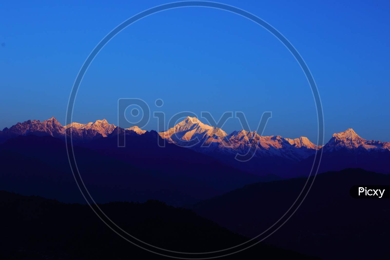 View of Mt Kanchenjunga with first rays of sunlight falling on it