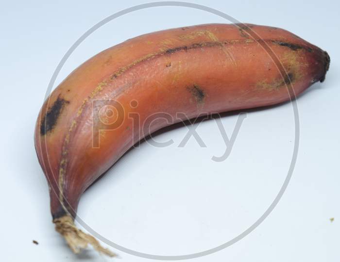 Bunch of fresh ripe red bananas on white background