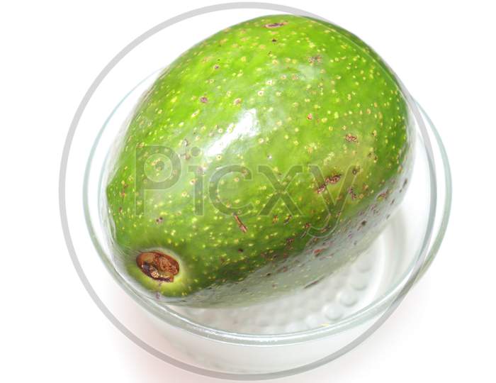 fresh avocado isolated on white background closeup
