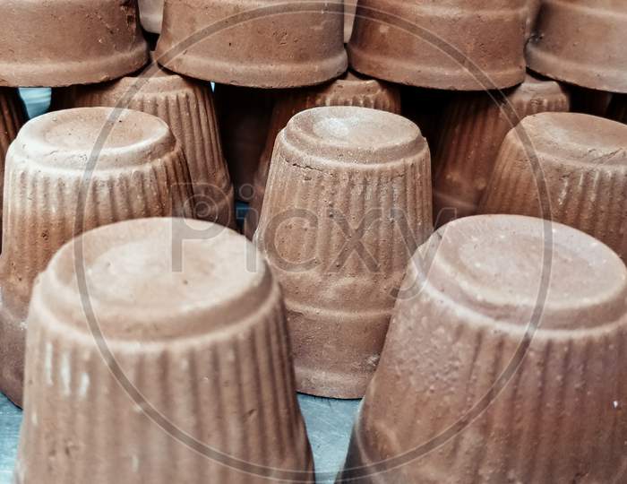 Image Of Cups Made Of Mud Or Sand Called Kulhad/Kullhad Used To Serve Authentic Indian Drinks Called Lassie/Lassi, Milk, Tea.