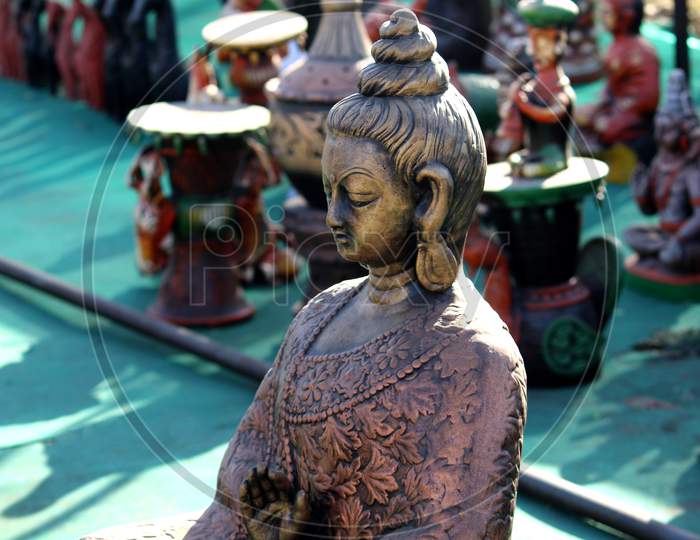 Buddha God Clay Sculpture
