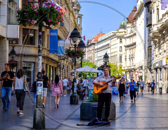 Street Guitarist Playing In Knez Mihailova Street In Belgrade, Capital Of Serbia
