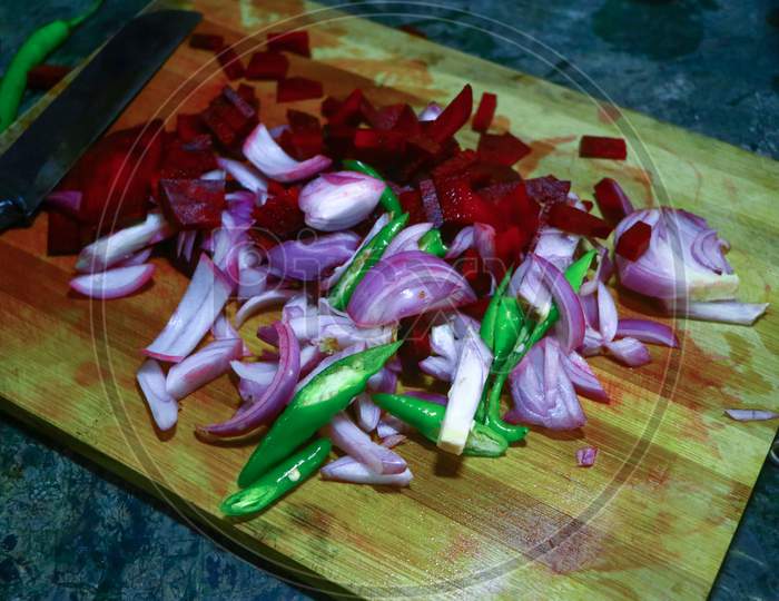 Chopped vegetables on wooden Cutting board
