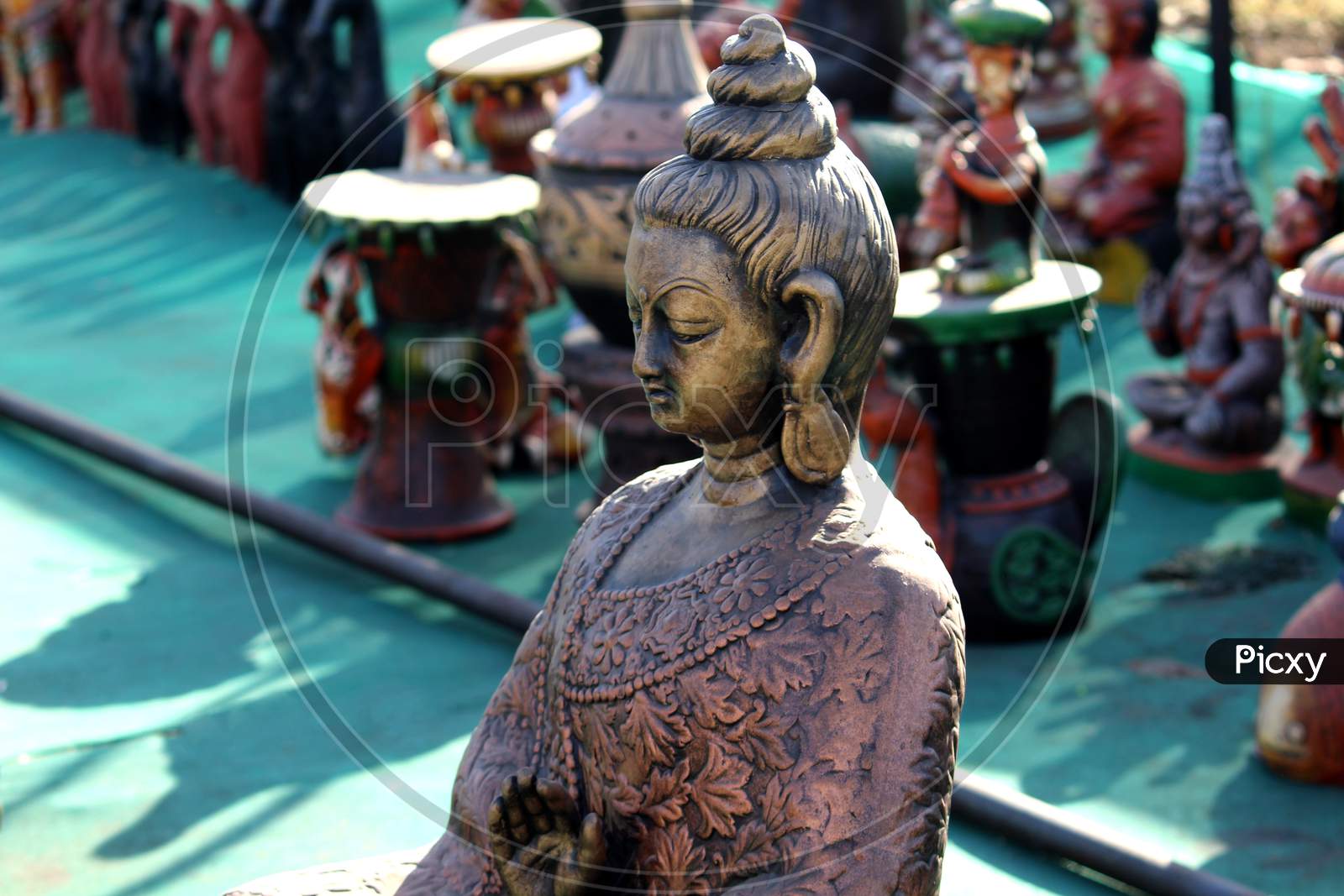 Buddha God Clay Sculpture