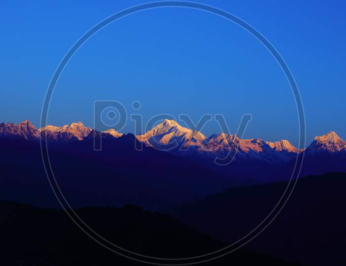 View of Mt Kanchenjunga with first rays of sunlight falling on it