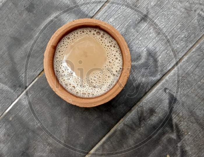 A Kulhar Or Kulhad Cup (Traditional Handle-Less Clay Cup) From North India Filled With Hot Indian Tea