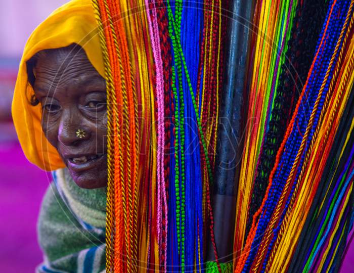 Old Women Selling Threads For Living