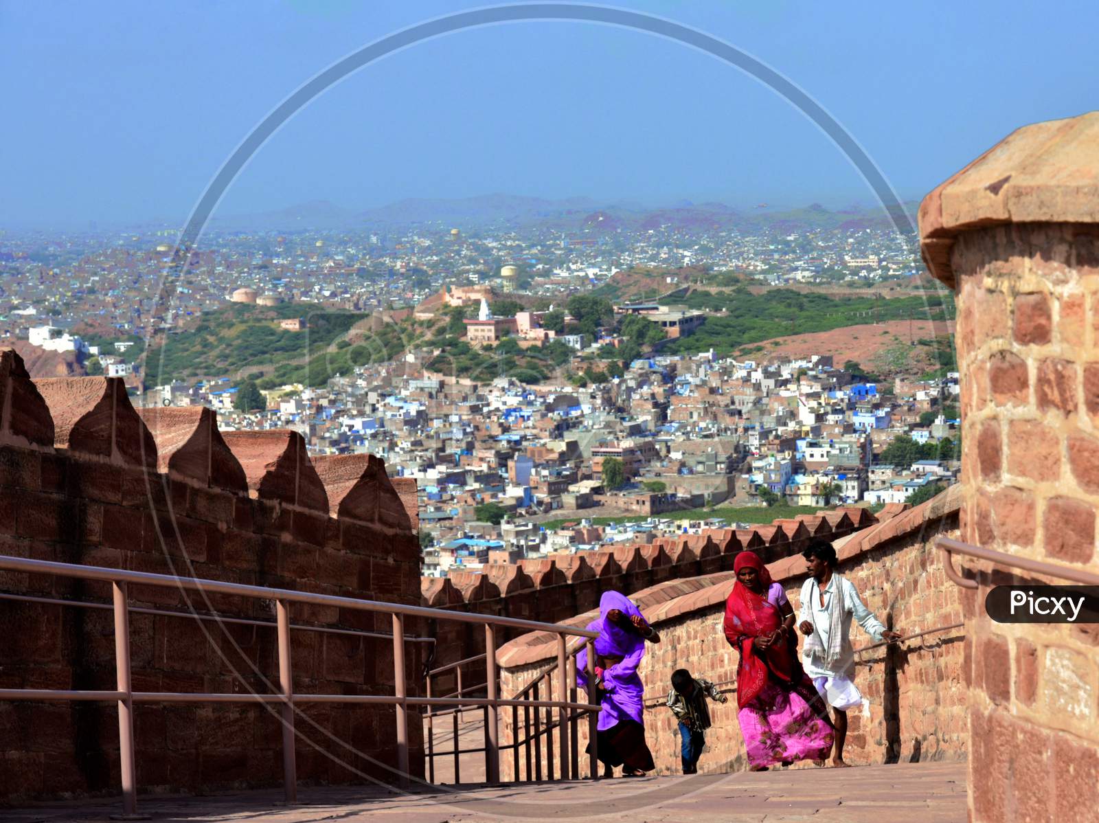 Some people in Mehrangarh Fort,Rajasthan with Jodh Pur City in the Back Ground