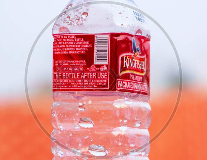 Delhi, India, December 2018 : Mineral Water Bottle In Kingfisher Brand With Blur Background.. Selective Focus