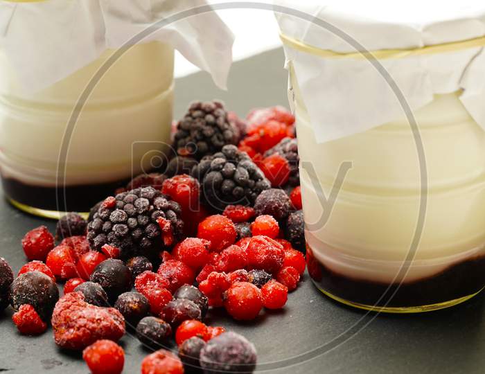 Organic Yogurts Of Blackberries And Red Fruits. Gastronomic Photography