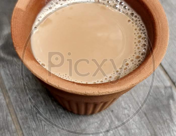 A Kulhar Or Kulhad Cup (Traditional Handle-Less Clay Cup) From North India Filled With Hot Indian Tea