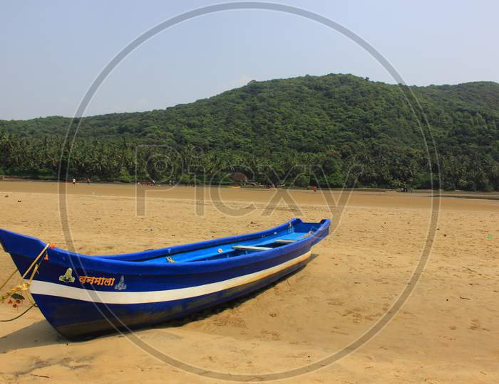 Malvan Sea beach with boat at early morning